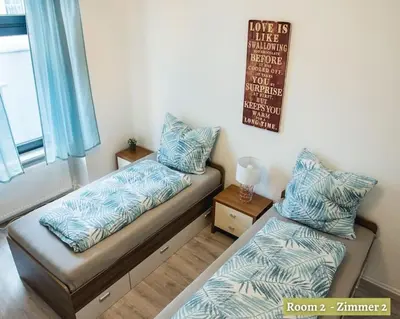 Ein Bett oder Betten in einem Zimmer der Unterkunft Urban Experience