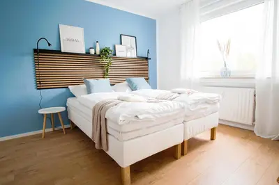 Ein Bett oder Betten in einem Zimmer der Unterkunft HOMEFY - Studio Heaven