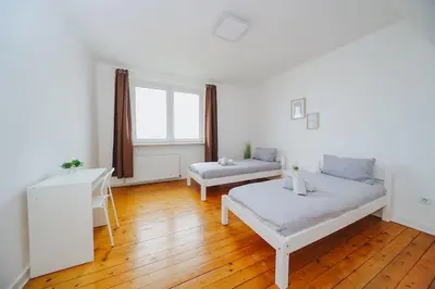 Ein Bett oder Betten in einem Zimmer der Unterkunft City Wohnung Zentral 89-11