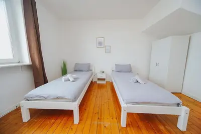 Ein Bett oder Betten in einem Zimmer der Unterkunft City Wohnung Zentral 89-11
