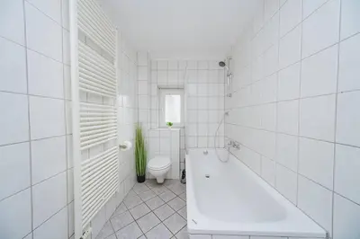 Ein Badezimmer in der Unterkunft City Wohnung Zentral 89-11