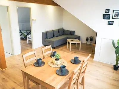 Ein Sitzbereich in der Unterkunft City Wohnung Zentral 89-12