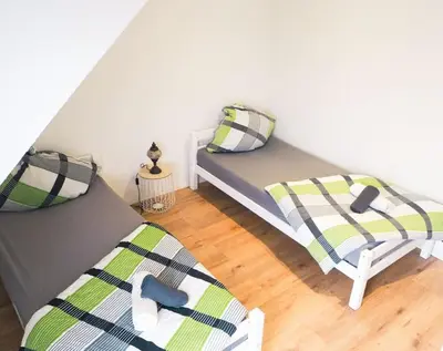 Ein Bett oder Betten in einem Zimmer der Unterkunft City Wohnung Zentral 89-12