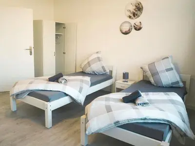 Ein Bett oder Betten in einem Zimmer der Unterkunft City Wohnung Zentral 89-10