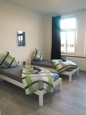 Ein Bett oder Betten in einem Zimmer der Unterkunft City Wohnung Zentral 89-10