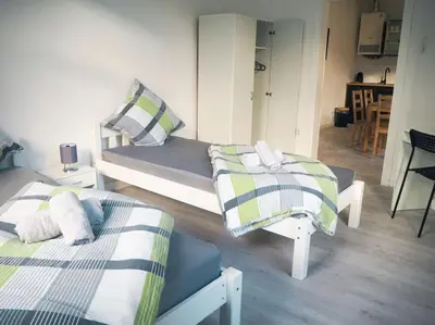 Ein Bett oder Betten in einem Zimmer der Unterkunft City Wohnung Zentral 89-10
