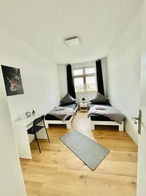 Ein Bett oder Betten in einem Zimmer der Unterkunft City Wohnung Zentral 85-5
