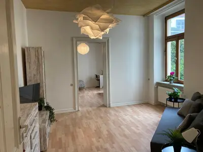 Ein Sitzbereich in der Unterkunft Cosy, new furniture, 10min walk to train station