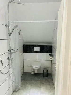 Ein Badezimmer in der Unterkunft Messe HV-2