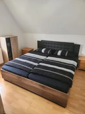 Ein Bett oder Betten in einem Zimmer der Unterkunft Wohnung HAMMer