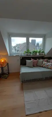 Ein Sitzbereich in der Unterkunft RüStudio, Nähe RÜ & Messe, Museum Folkwang, NETFLIX