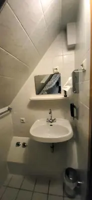 Ein Badezimmer in der Unterkunft Hotel 9-enhof