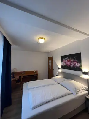 Ein Bett oder Betten in einem Zimmer der Unterkunft Hotel 9-enhof