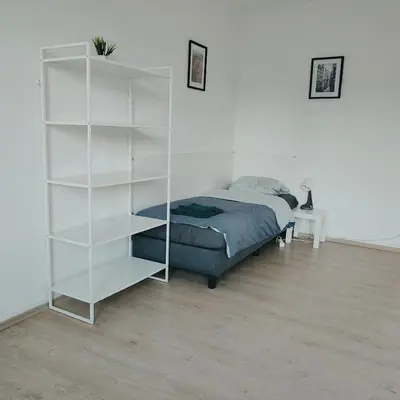 Ein Bett oder Betten in einem Zimmer der Unterkunft Monteur-Ferien-Messewohnung Mettmann 6 Personen 2 OG