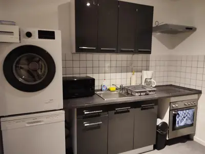 Küche/Küchenzeile in der Unterkunft Monteur-Ferien-Messewohnung Mettmann 6 Personen 2 OG