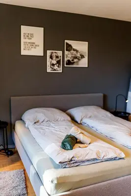 Ein Bett oder Betten in einem Zimmer der Unterkunft Modernes Apartment l Oasis l mit Balkon Nähe Hauptbahnhof
