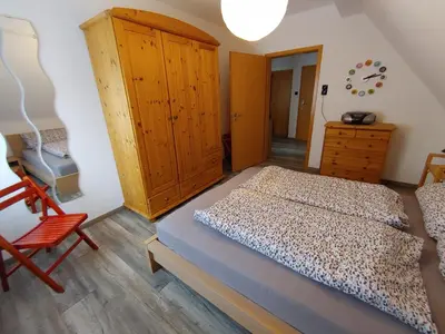 Ein Bett oder Betten in einem Zimmer der Unterkunft Vierzimmerwohnung am Harkortsee