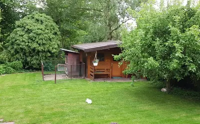Ein Garten an der Unterkunft Vierzimmerwohnung am Harkortsee