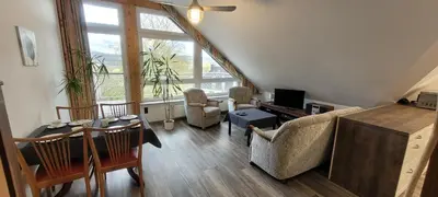 Ein Sitzbereich in der Unterkunft Vierzimmerwohnung am Harkortsee