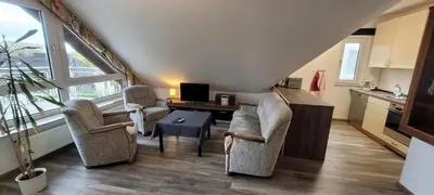 Ein Sitzbereich in der Unterkunft Vierzimmerwohnung am Harkortsee