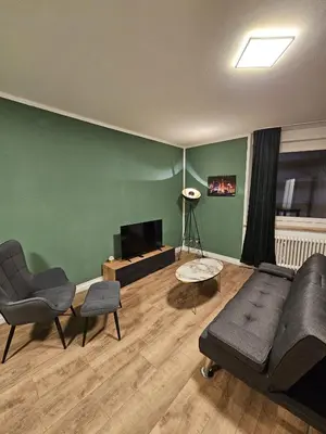Ein Sitzbereich in der Unterkunft Sweet Home - 5 -