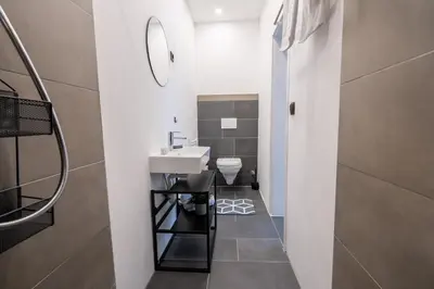 Ein Badezimmer in der Unterkunft MIRA StudioApartments NEU