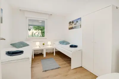 Ein Bett oder Betten in einem Zimmer der Unterkunft Stilvoller Bungalow in Selm-Cappenberg