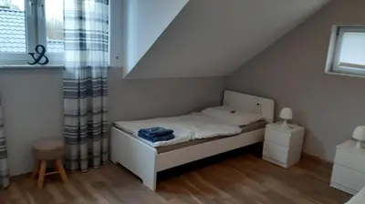 Ein Bett oder Betten in einem Zimmer der Unterkunft Work & Stay Apartments- mit Einzelzimmer