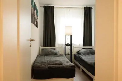 Ein Bett oder Betten in einem Zimmer der Unterkunft Möblierte 3-Zimmer-Wohnung nahe Düsseldorf in Duisburg-Süd