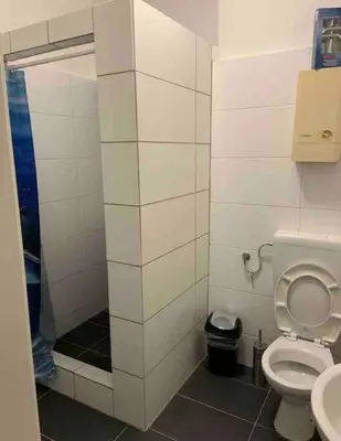 Ein Badezimmer in der Unterkunft FeWo Born