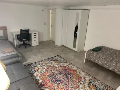 Ein Sitzbereich in der Unterkunft Souterrain Wohnung in der Nähe vom Düsseldorfer Flughafen