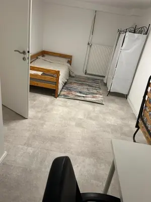 Ein Bett oder Betten in einem Zimmer der Unterkunft Souterrain Wohnung in der Nähe vom Düsseldorfer Flughafen