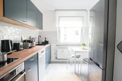 Küche/Küchenzeile in der Unterkunft HOMEFY - Holiday Apartment