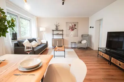 Ein Sitzbereich in der Unterkunft HOMEFY - Holiday Apartment