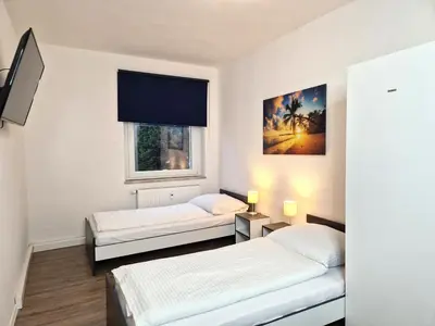 Ein Bett oder Betten in einem Zimmer der Unterkunft Meribu L92 Wohnung für Monteure und Arbeiter