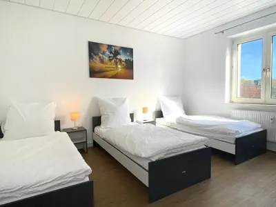 Ein Bett oder Betten in einem Zimmer der Unterkunft Meribu L92 Wohnung für Monteure und Arbeiter