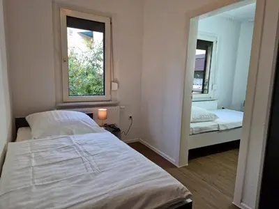 Ein Bett oder Betten in einem Zimmer der Unterkunft Meribu L92 Wohnung für Monteure und Arbeiter