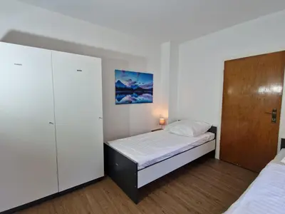 Ein Bett oder Betten in einem Zimmer der Unterkunft Meribu L92 Wohnung für Monteure und Arbeiter