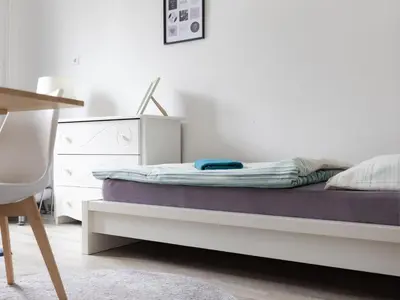 Ein Bett oder Betten in einem Zimmer der Unterkunft Schmuckstück am Fuße von Rüttenscheid Nähe Zentrum, Uniklinik & Messe Netflix & Prime