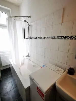 Ein Badezimmer in der Unterkunft FeWo Hafen: Apartment in a Great Location