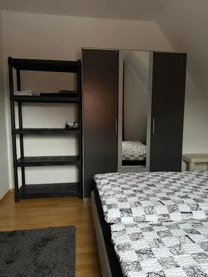 Ein Bett oder Betten in einem Zimmer der Unterkunft Hammer Wohnung