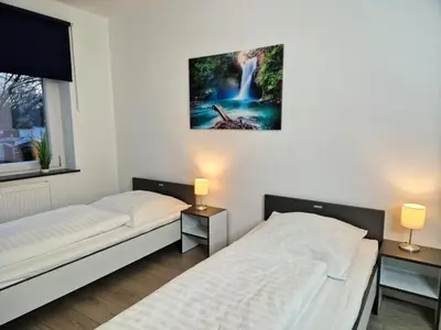 Ein Bett oder Betten in einem Zimmer der Unterkunft Meribu G31 Wohnung für Monteure und Arbeiter