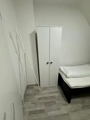 Ein Bett oder Betten in einem Zimmer der Unterkunft Meribu F85-87 Wohnung für Monteure und Arbeiter