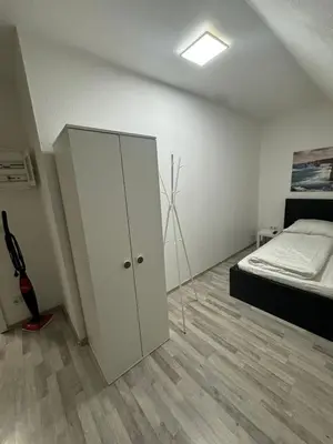 Ein Bett oder Betten in einem Zimmer der Unterkunft Meribu F85-87 Wohnung für Monteure und Arbeiter