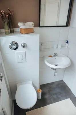 Ein Badezimmer in der Unterkunft Central-Living brown - Wifi - Netflix - 5 Pers