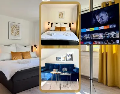 Ein Bett oder Betten in einem Zimmer der Unterkunft Design Apartment, Küche, Smart-TV, WLAN
