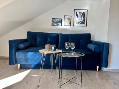 Ein Sitzbereich in der Unterkunft Design Apartment, Küche, Smart-TV, WLAN