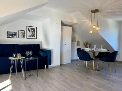 Ein Sitzbereich in der Unterkunft Design Apartment, Küche, Smart-TV, WLAN
