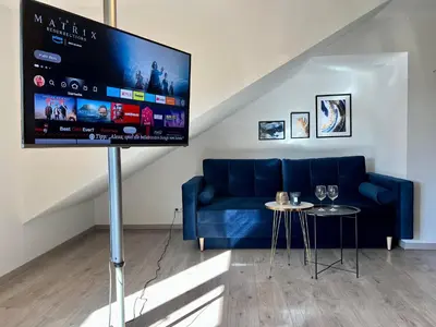 Ein Sitzbereich in der Unterkunft Design Apartment, Küche, Smart-TV, WLAN
