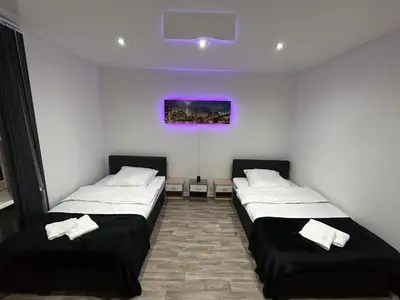 Ein Bett oder Betten in einem Zimmer der Unterkunft Wellness Suite mit Whirlpool & Sauna